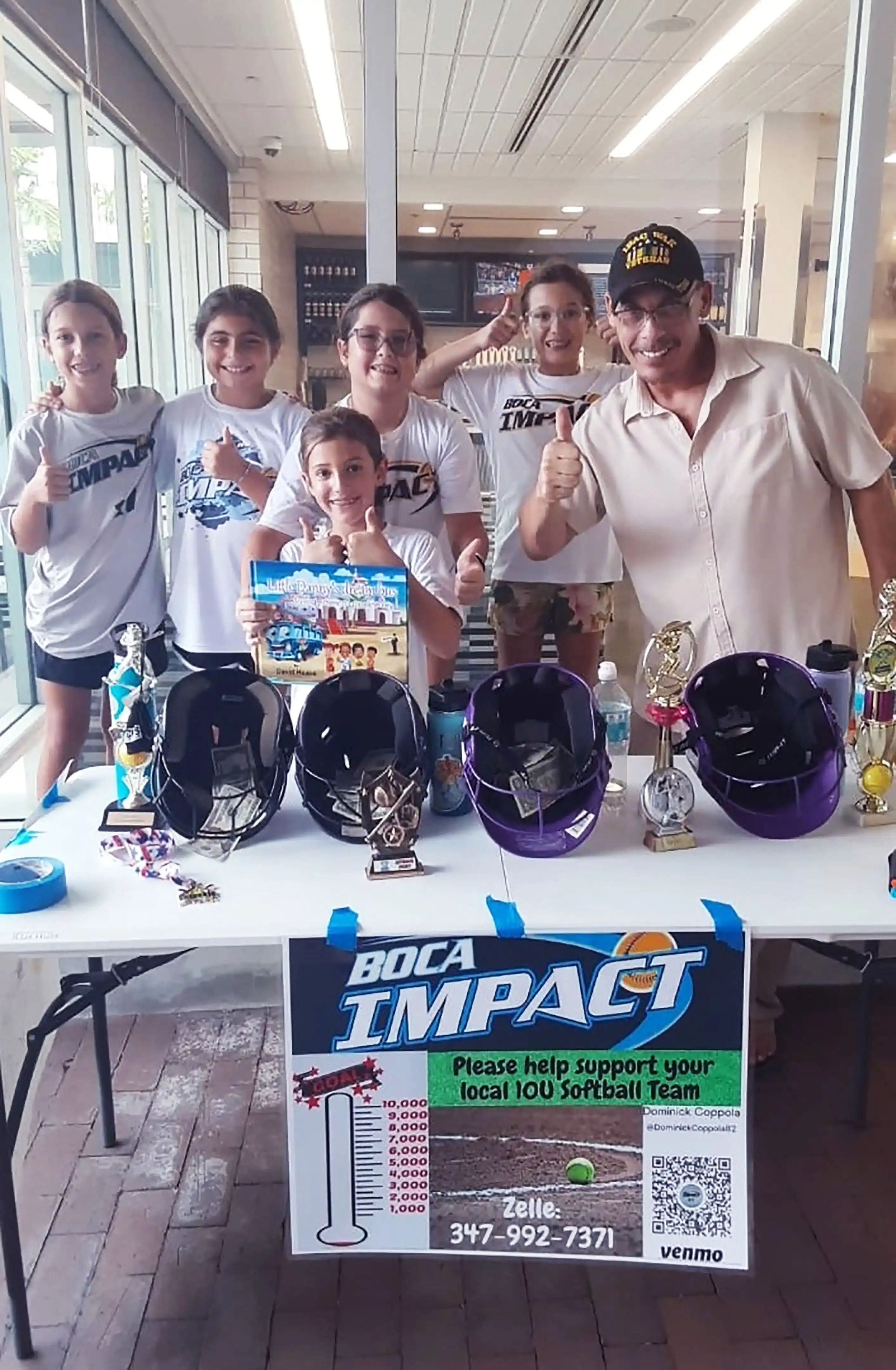 Author and Veteran David Haave gives back to the community by supporting girls softball Boca Raton, Florida, USA -- David Haave